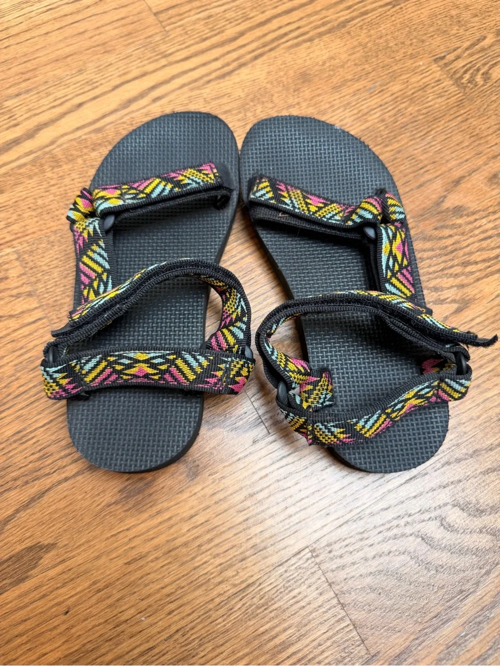 Teva Black Sandals with Yellow, Pink & Teal Patterned Straps Kids 1